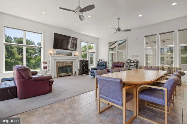 a bedroom with a bed and a television