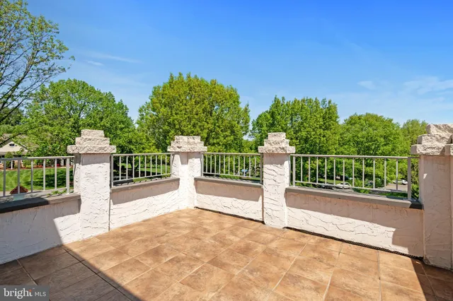 a view of entryway with stairs and wooden floor