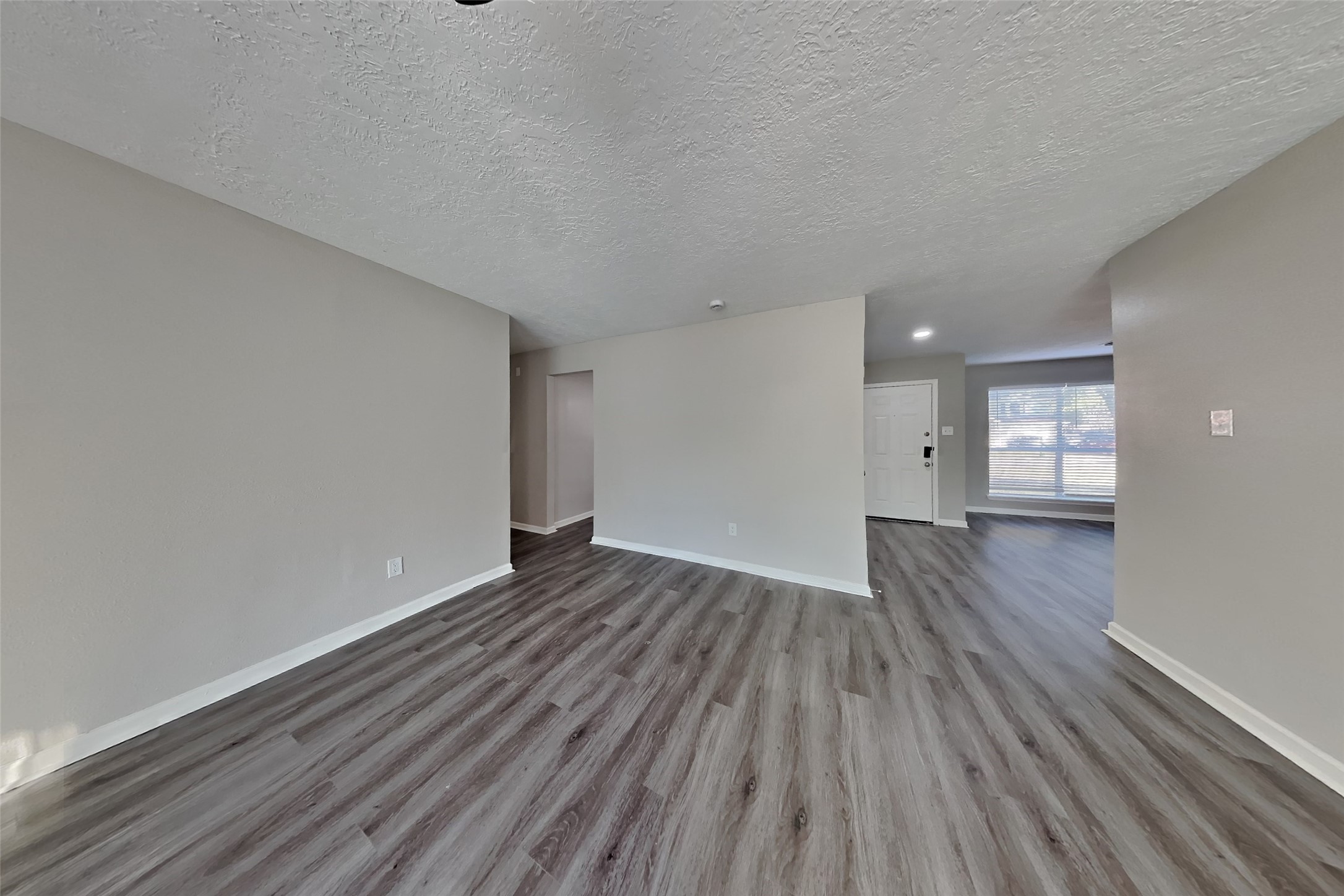 2217 Clemson Drive Katy, TX 77493 - Photo 5 of 18 a view of empty room with wooden floor