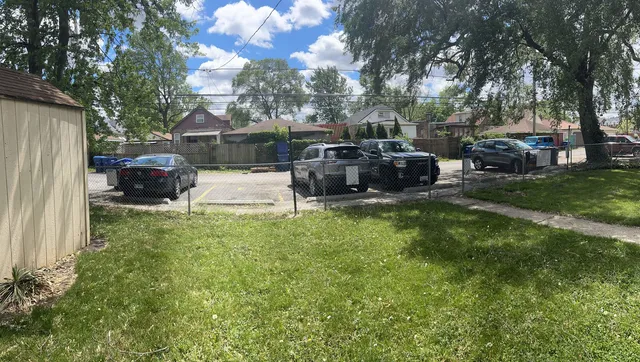 a childrens park with lots of swings and slides