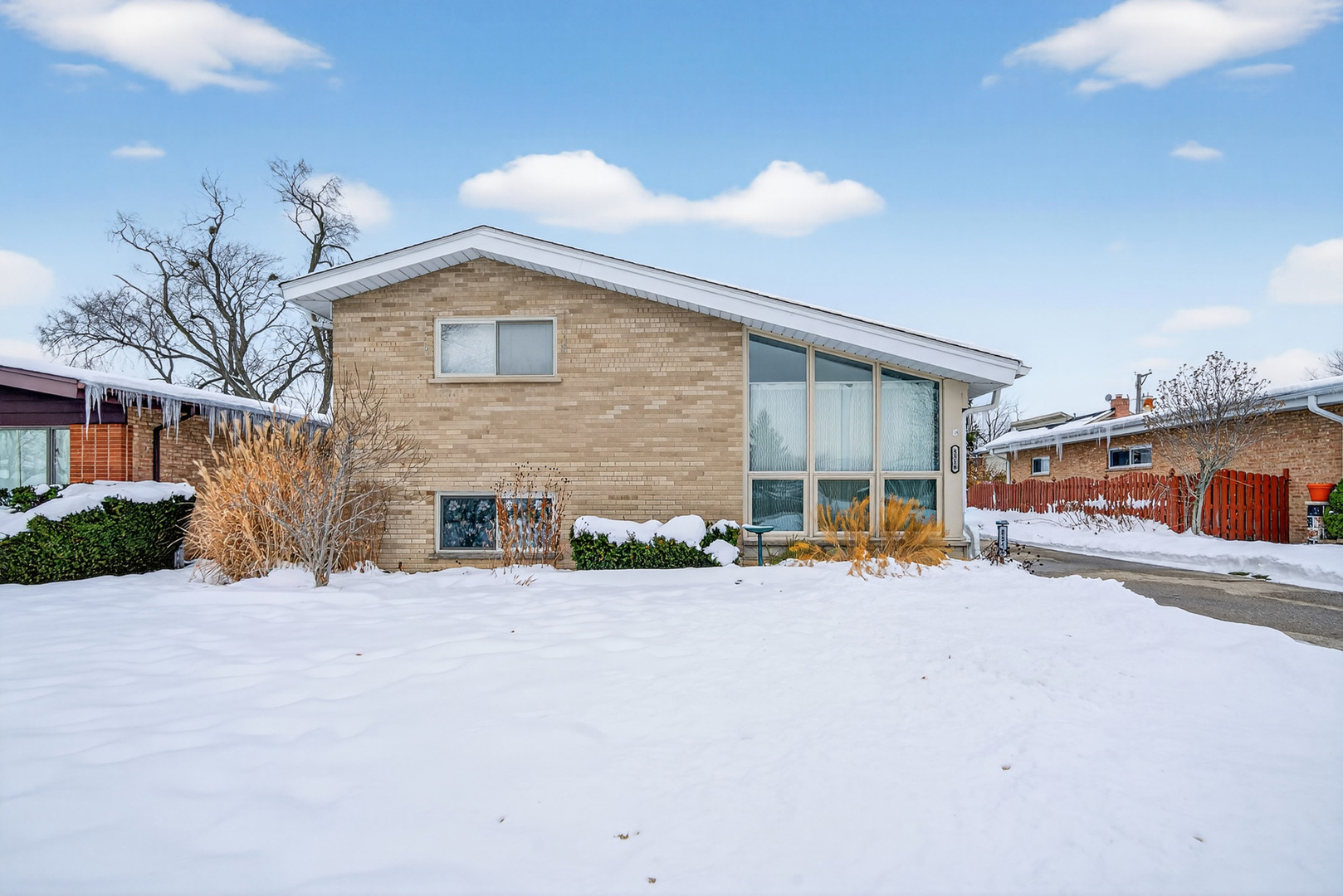 8516 West Normal Avenue Niles, IL 60714 - Photo 2 of 35 a view of a house with a snow in front of it