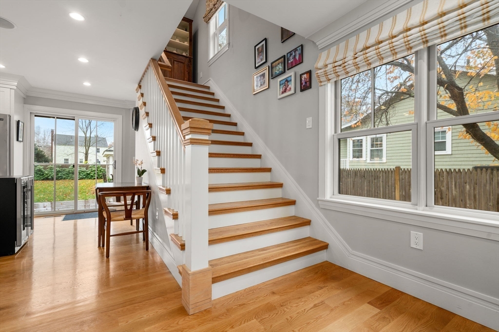 106 Jefferson Street Dedham, MA 02026 - Photo 13 of 42 a view of entryway and hall with wooden floor