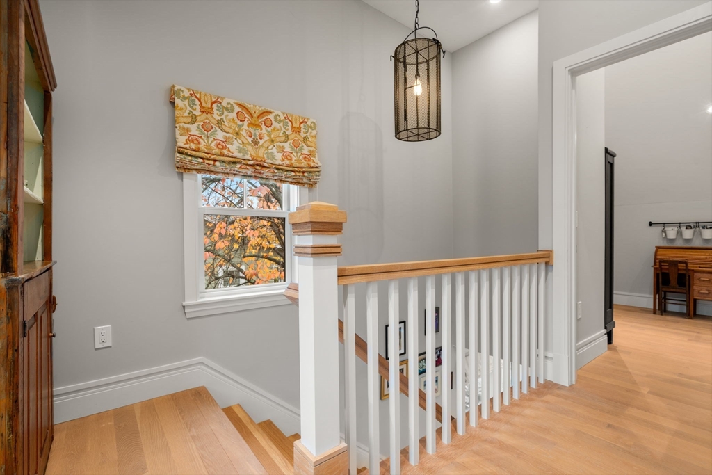 106 Jefferson Street Dedham, MA 02026 - Photo 23 of 42 a view of entryway with wooden floor