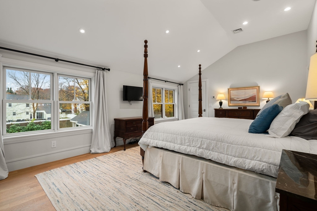106 Jefferson Street Dedham, MA 02026 - Photo 26 of 42 a bedroom with a large bed and a large window