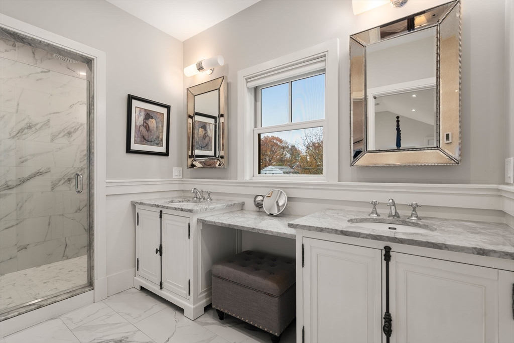 106 Jefferson Street Dedham, MA 02026 - Photo 29 of 42 a bathroom with a sink and a mirror