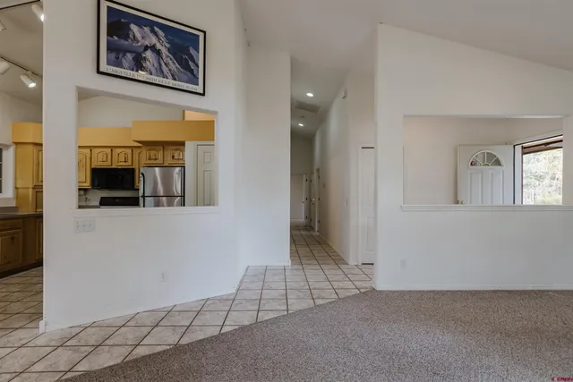 en empty room with wooden floor