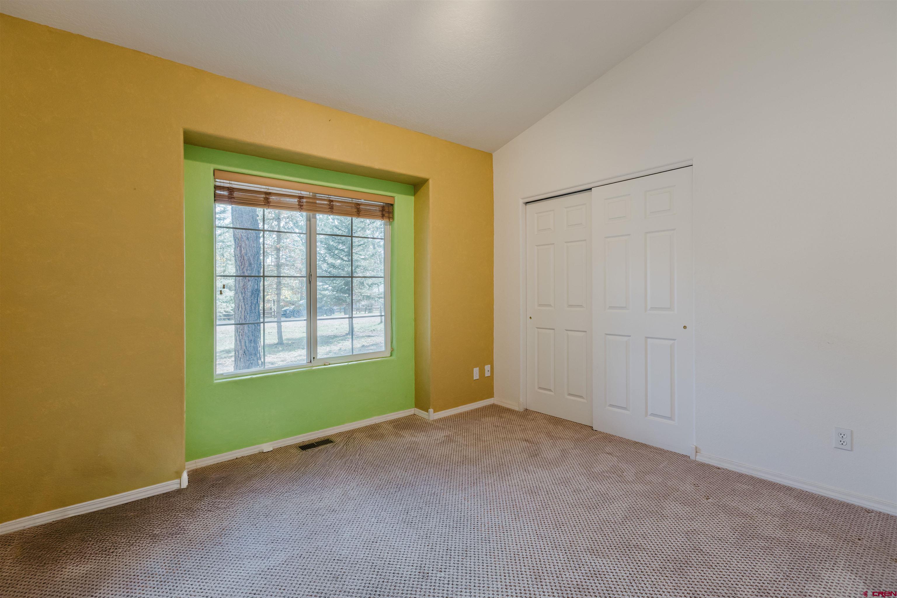 285 Beaver Circle Pagosa Springs, CO 81147 - Photo 30 of 42 a view of an empty room with a window