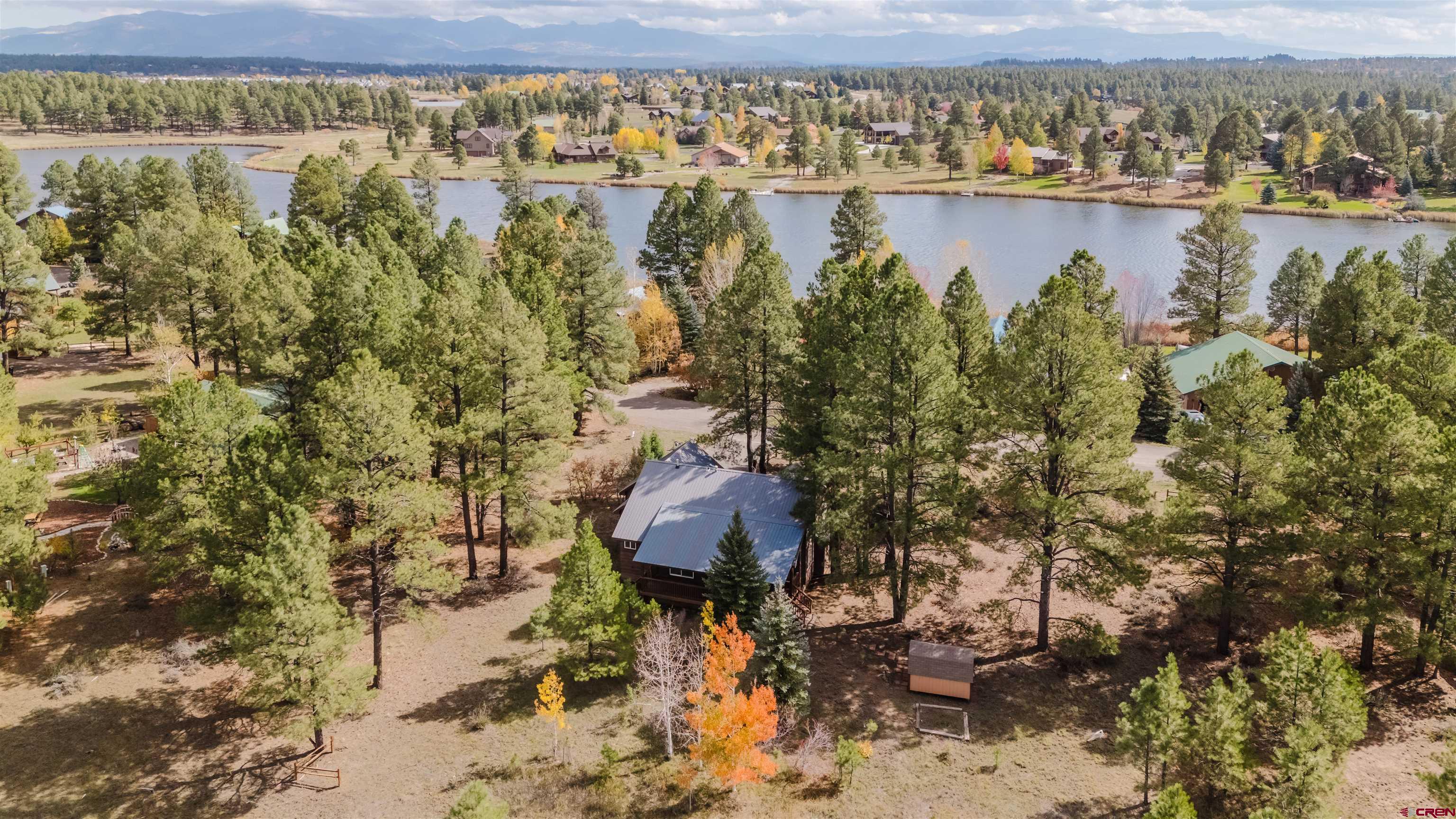 285 Beaver Circle Pagosa Springs, CO 81147 - Photo 5 of 42 a view of a lake with a mountain view