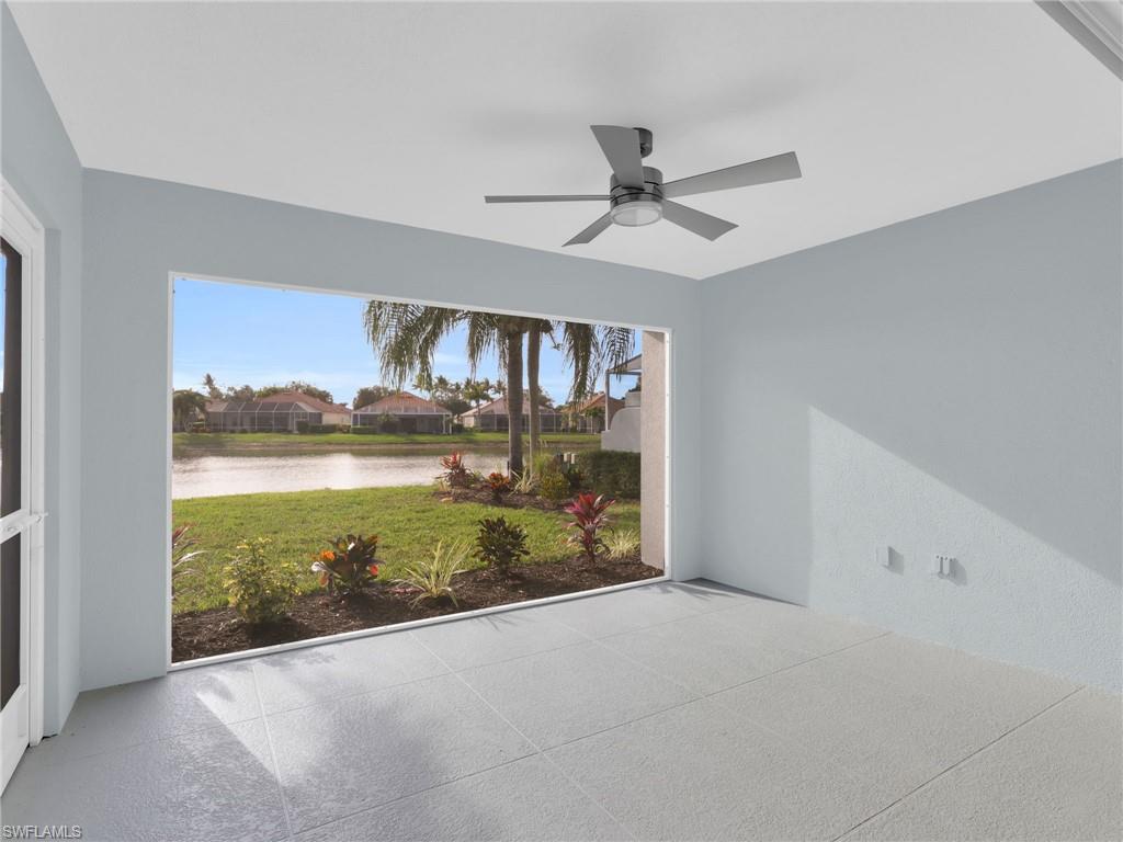 4231 Redonda Lane Naples, FL 34119 - Photo 21 of 42 a view of a glass door and a balcony