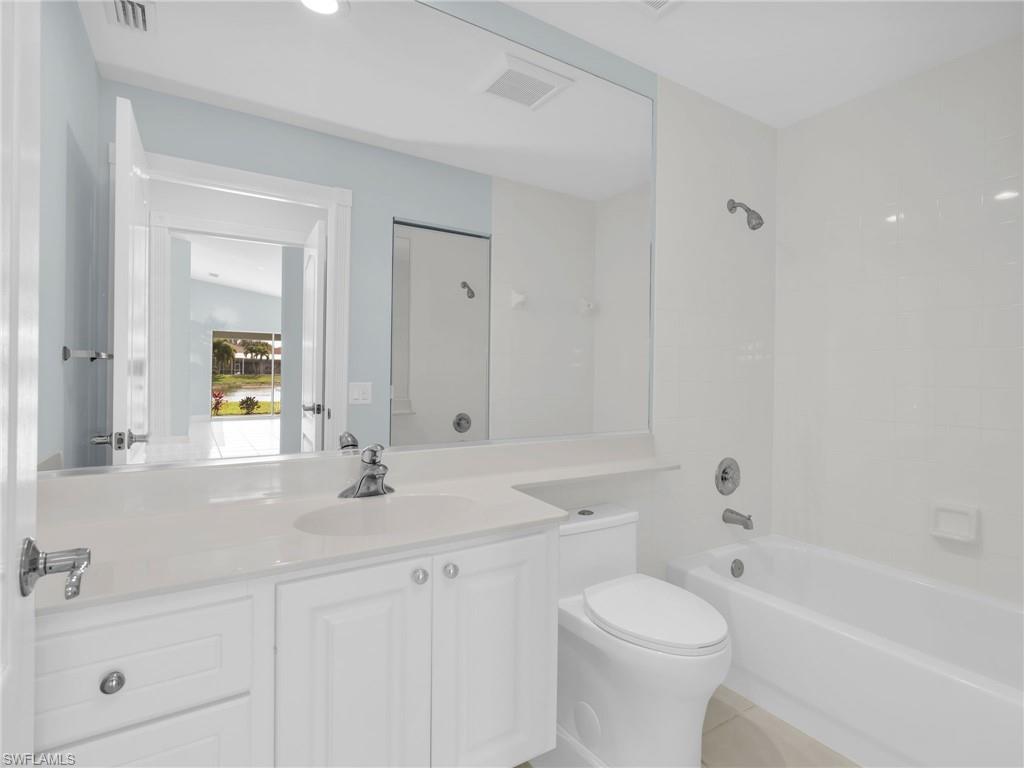 4231 Redonda Lane Naples, FL 34119 - Photo 31 of 42 a bathroom with a sink toilet and shower