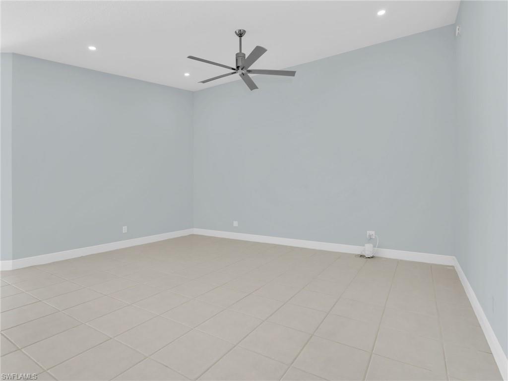 4231 Redonda Lane Naples, FL 34119 - Photo 8 of 42 a view of an empty room