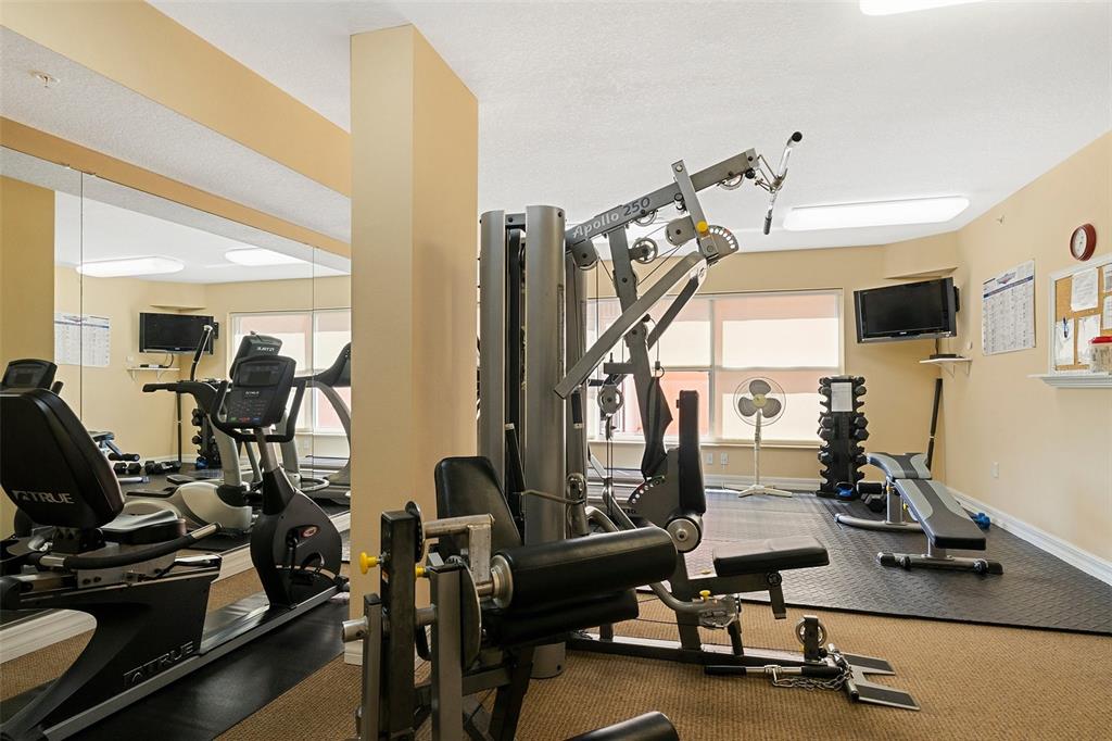 4516 Seagull Drive, Unit 810 New Port Richey, FL 34652 - Photo 11 of 54 a view of a room with gym equipment