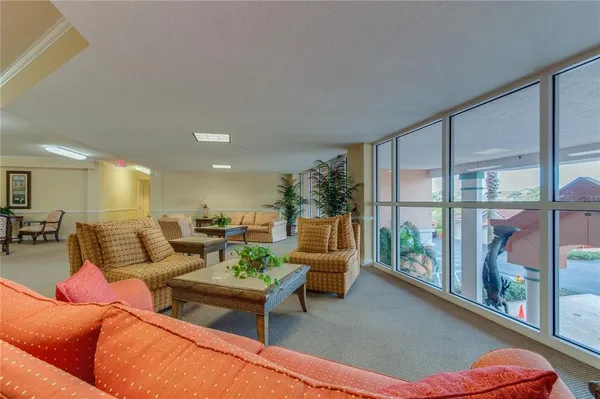 a living room with furniture and a couch