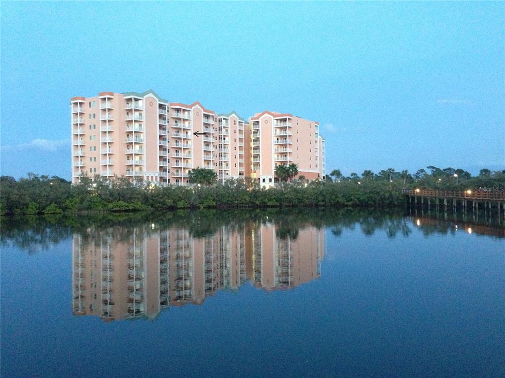 4516 Seagull Drive, Unit 810 New Port Richey, FL 34652 - Photo 54 of 54 a view of a lake and tall building