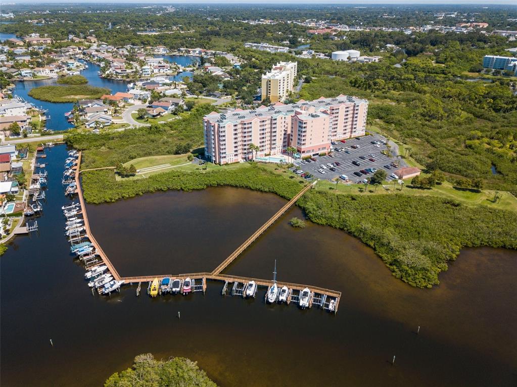 4516 Seagull Drive, Unit 810 New Port Richey, FL 34652 - Photo 9 of 54 an aerial view of residential houses with outdoor space