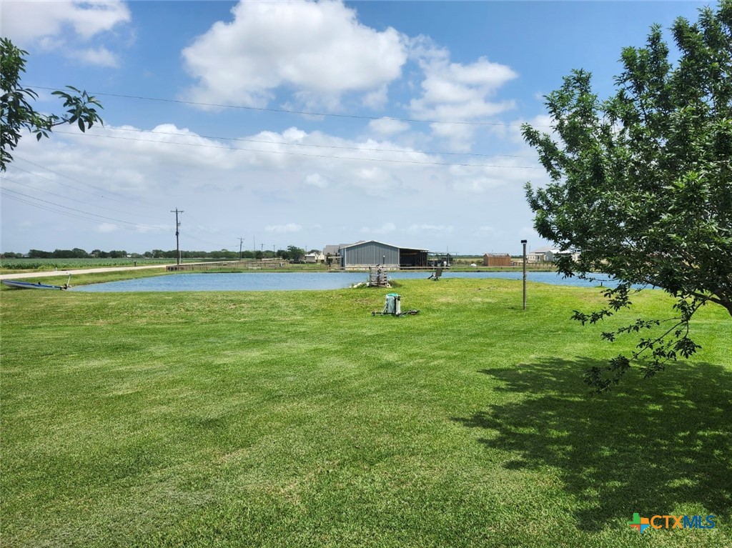 1845 Royal Road Port Lavaca, TX 77979 - Photo 19 of 22 a view of a green field with an trees in the background