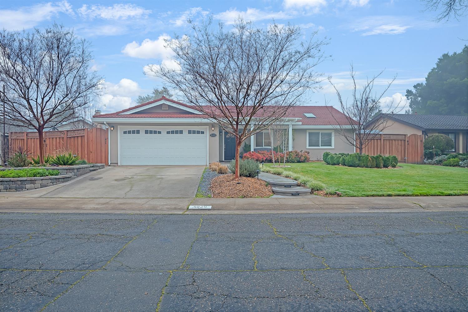 5220 Shelato Way Carmichael, CA 95608 - Photo 1 of 40 a front view of house with yard and trees