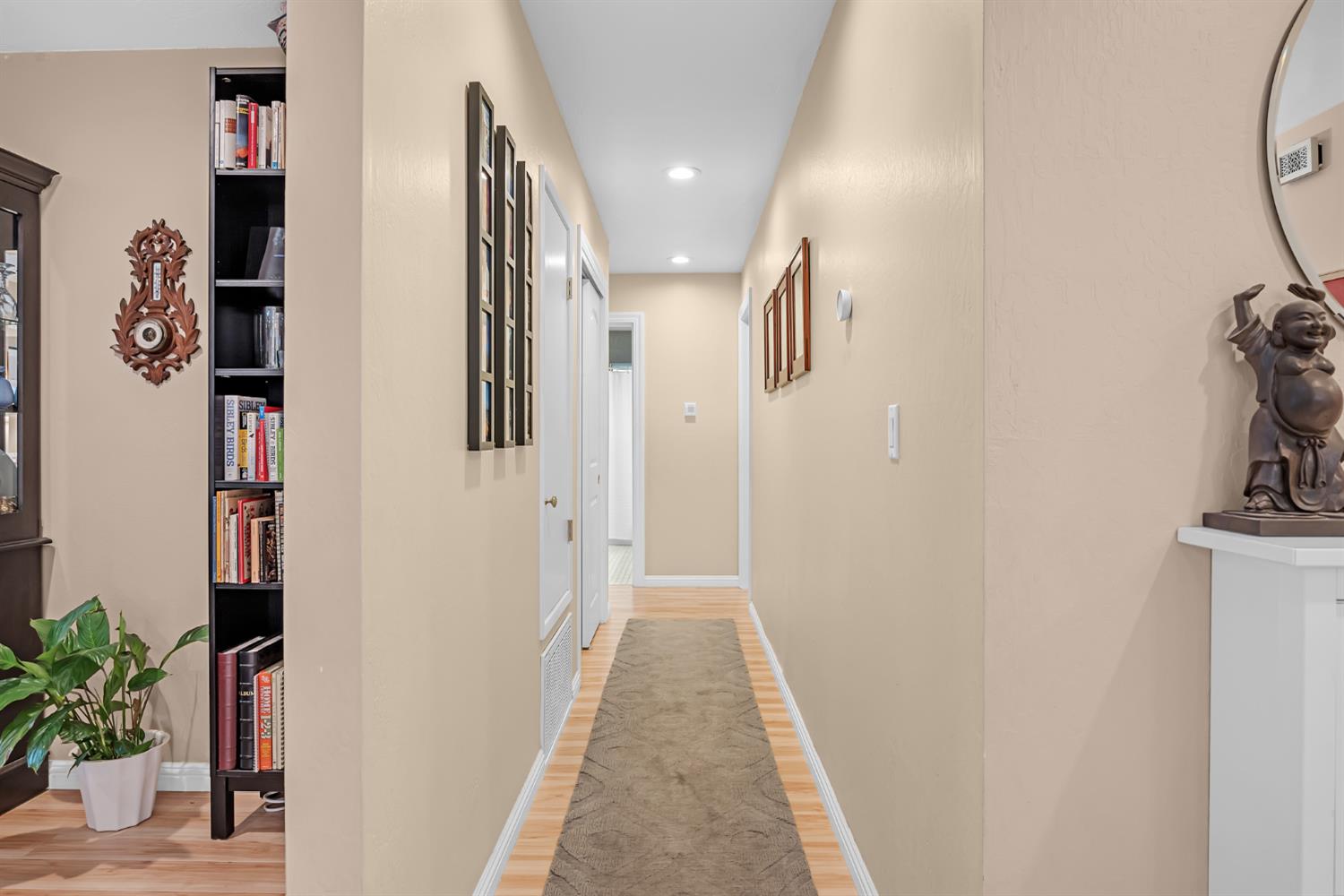5220 Shelato Way Carmichael, CA 95608 - Photo 18 of 40 a view of hallway with shower and wooden floor
