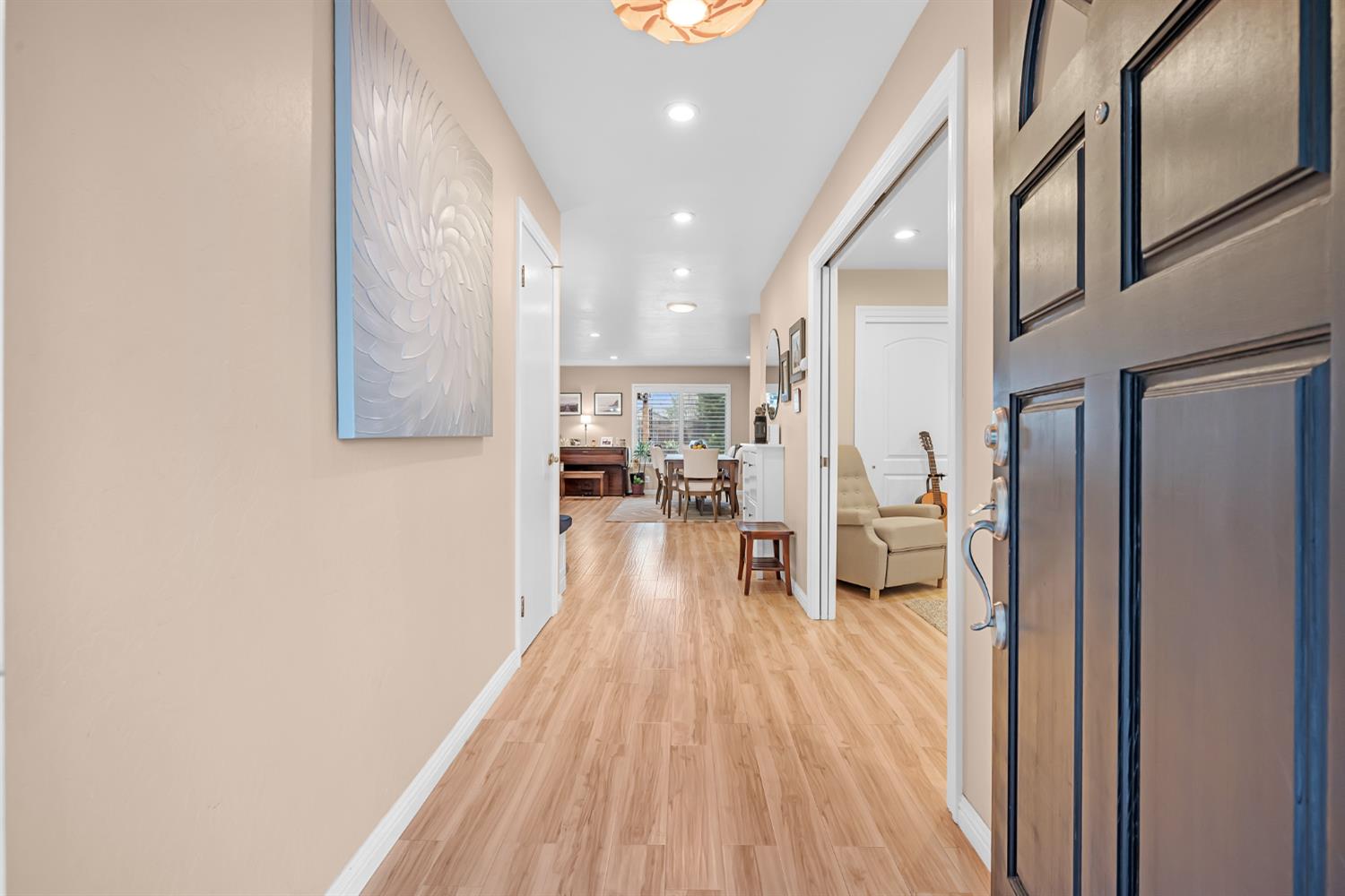 5220 Shelato Way Carmichael, CA 95608 - Photo 2 of 40 a living room with stainless steel appliances furniture a rug and a kitchen view