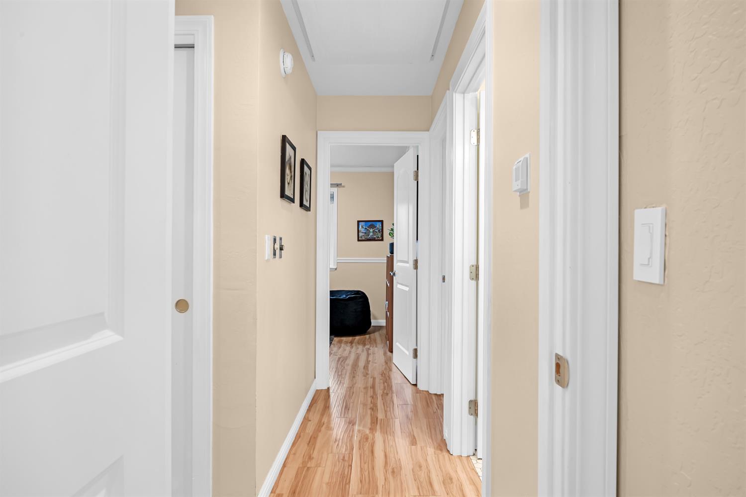 5220 Shelato Way Carmichael, CA 95608 - Photo 23 of 40 a view of a hallway with wooden floor and staircase