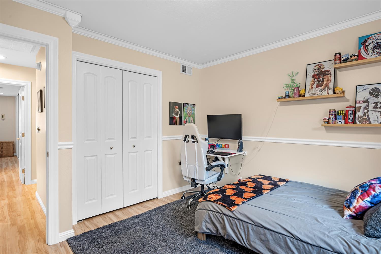 5220 Shelato Way Carmichael, CA 95608 - Photo 27 of 40 a bedroom with furniture and a flat screen tv