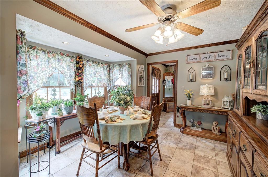 3637 Nebo Road Hiram, GA 30141 - Photo 24 of 63 a dining room with furniture and window