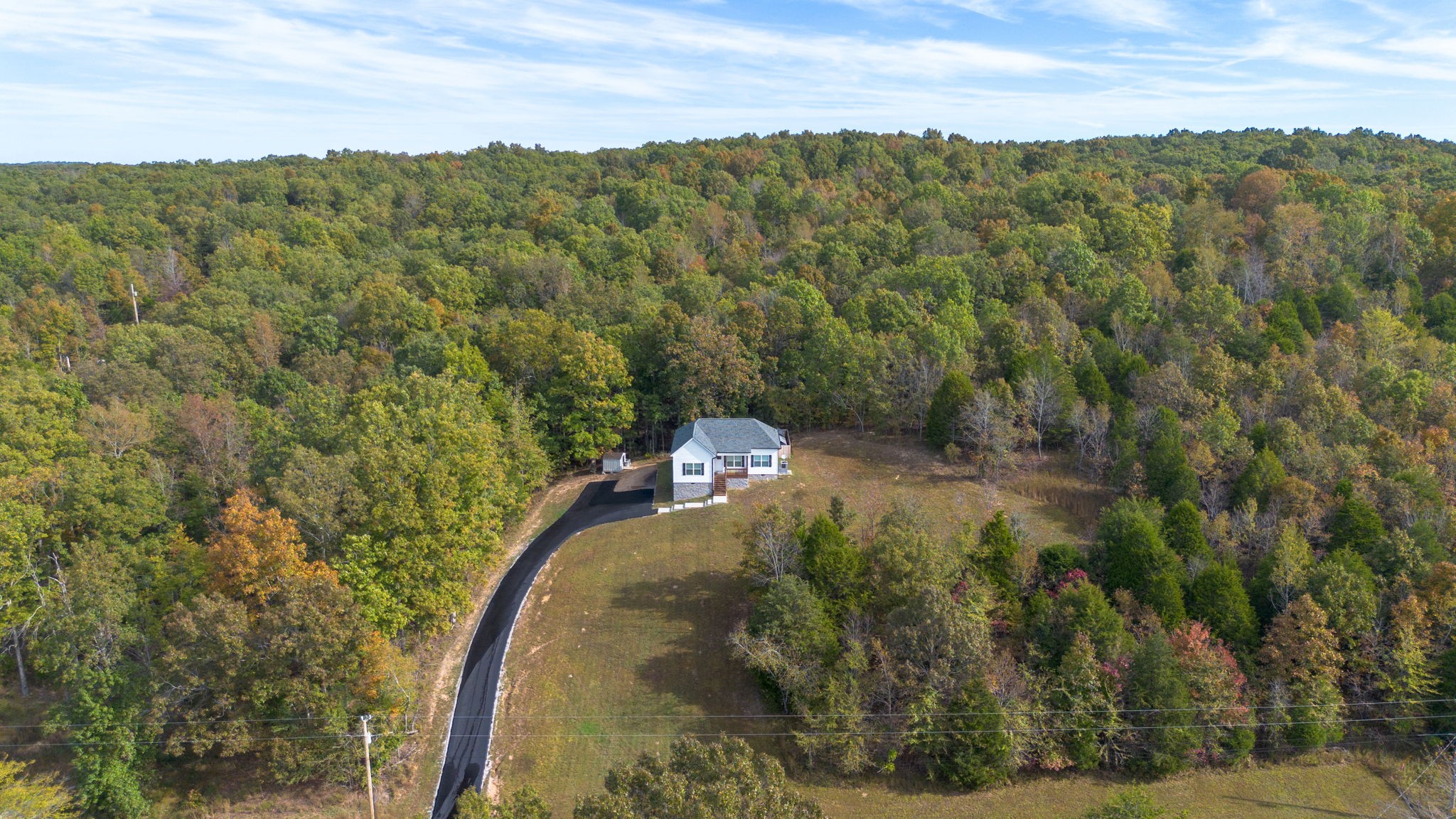 2800 North Hurricane Creek Road McEwen, TN 37101 - Photo 33 of 36 a view of a forest with a forest