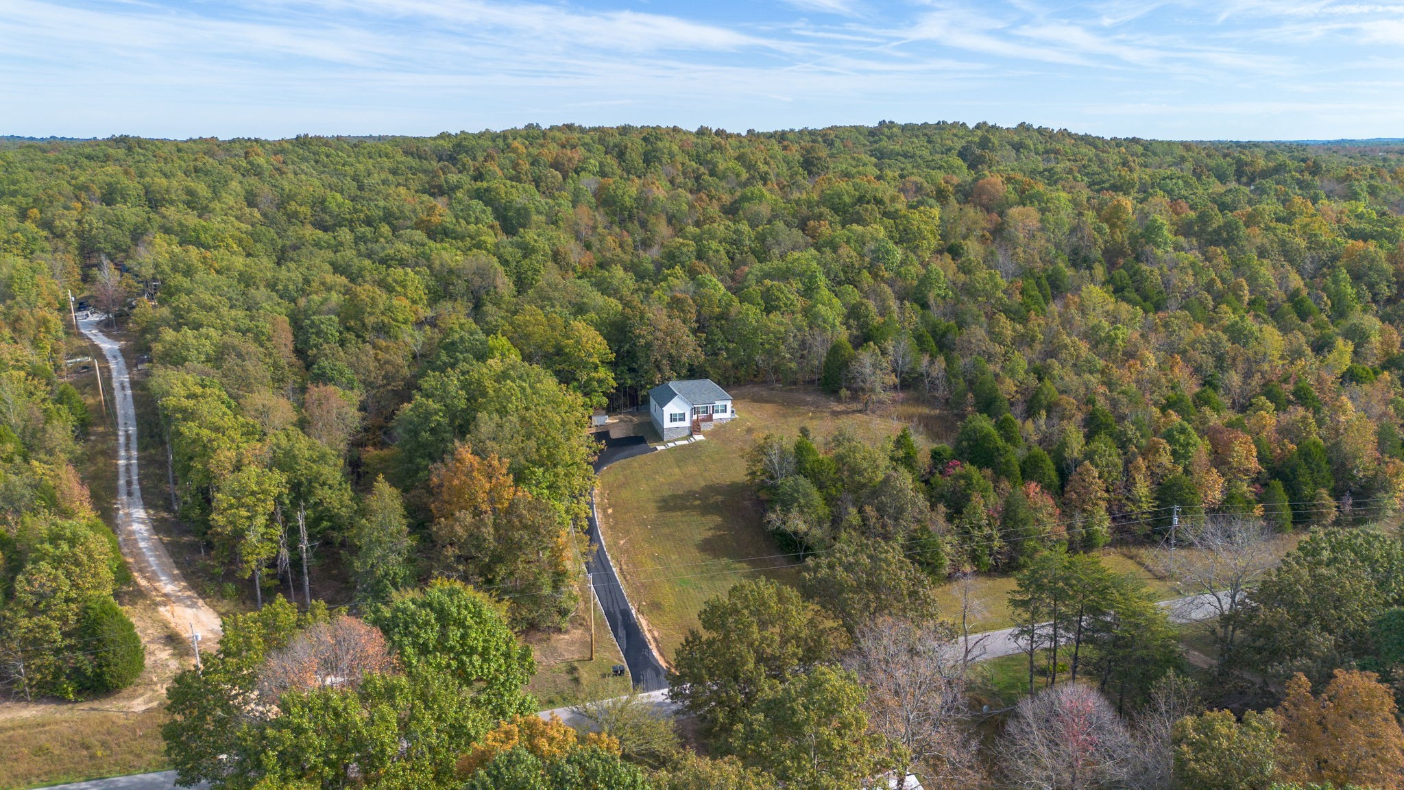 2800 North Hurricane Creek Road McEwen, TN 37101 - Photo 35 of 36 a view of a forest with a forest