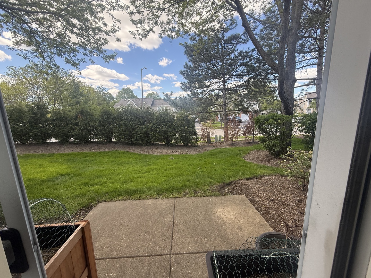 348 Fallbrook Court Schaumburg, IL 60107 - Photo 10 of 21 a view of a yard with plants and trees