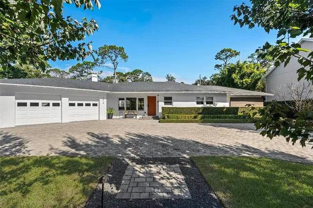 front view of a house with a big yard