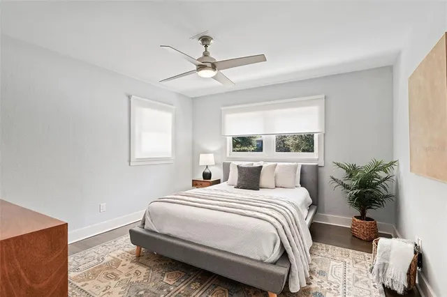 a house with swimming pool in front of it