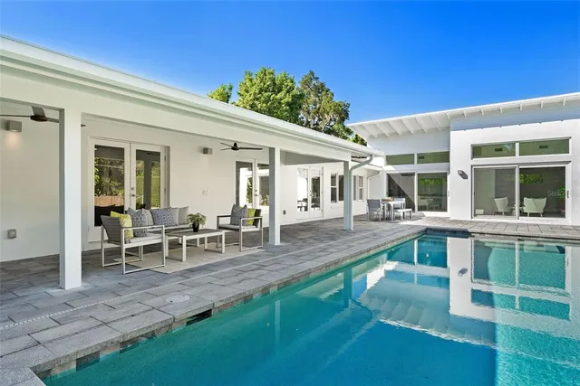 a view of a house with a swimming pool