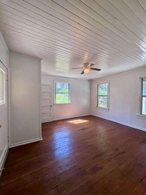 240 Pleasant Street Colfax, CA 95713 - Photo 15 of 26 an empty room with wooden floor and windows