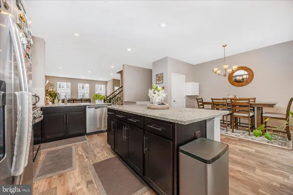 a front view of a building with a lot of windows