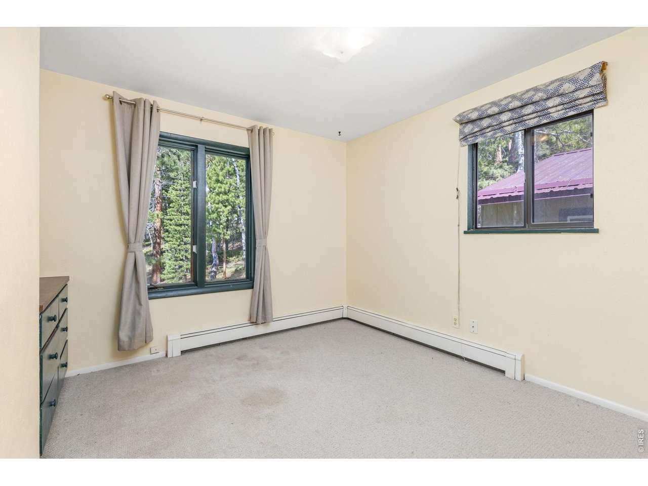 414 Upper Travis Gulch Road Black Hawk, CO 80422 - Photo 20 of 50 a view of an empty room with a window