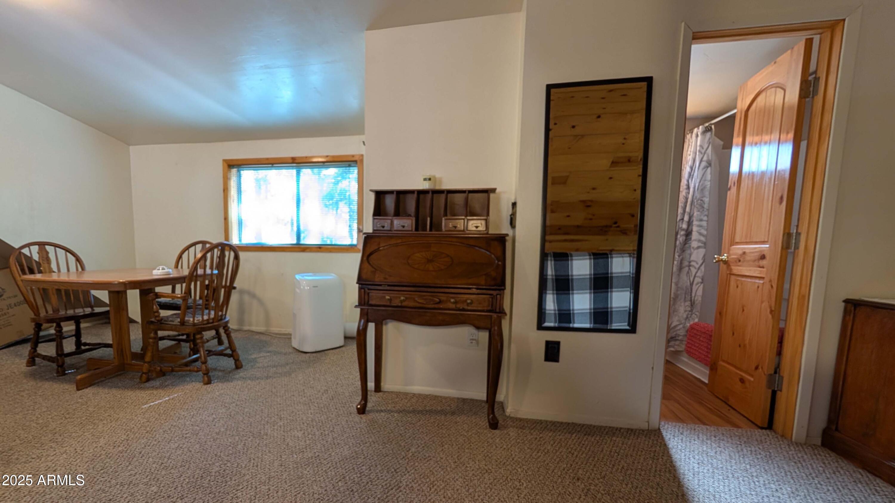 2425 Tall Trees Loop Forest Lakes, AZ 85931 - Photo 13 of 43 a dining room with furniture and window