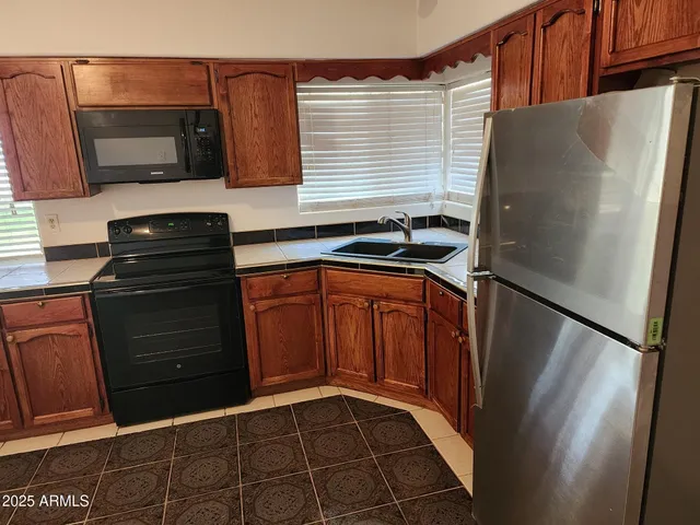 a view of a backyard with plants