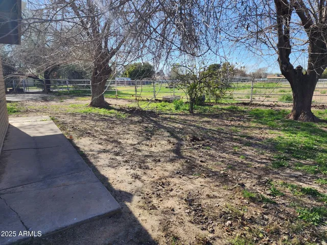 a bathroom with a sink toilet vanity and shower