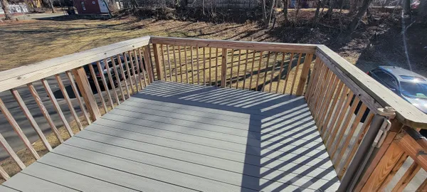 a view of stairs and wooden floor