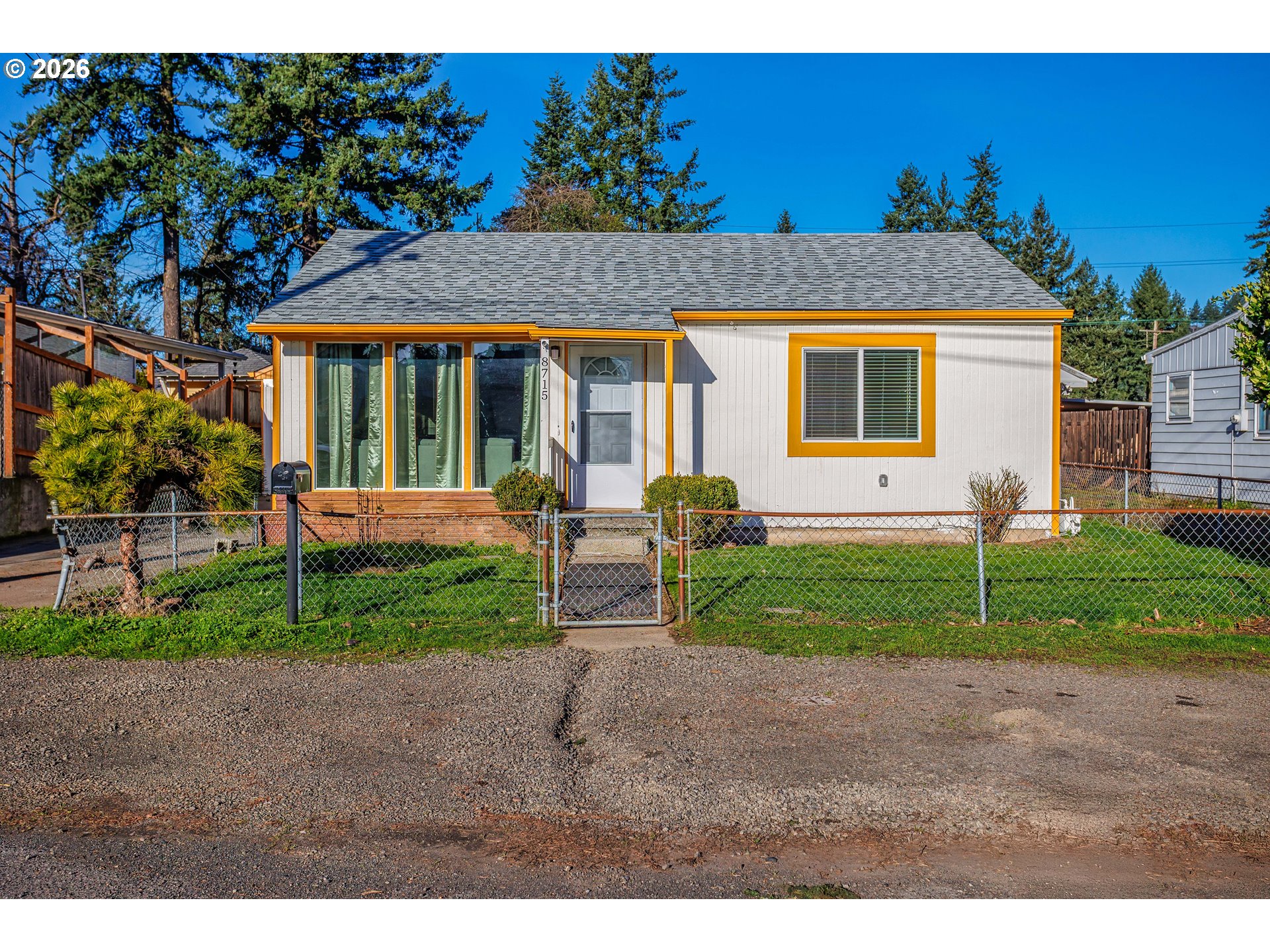 8715 Northeast Clackamas Street Portland, OR 97220 - Photo 1 of 25 a front view of a house with garden