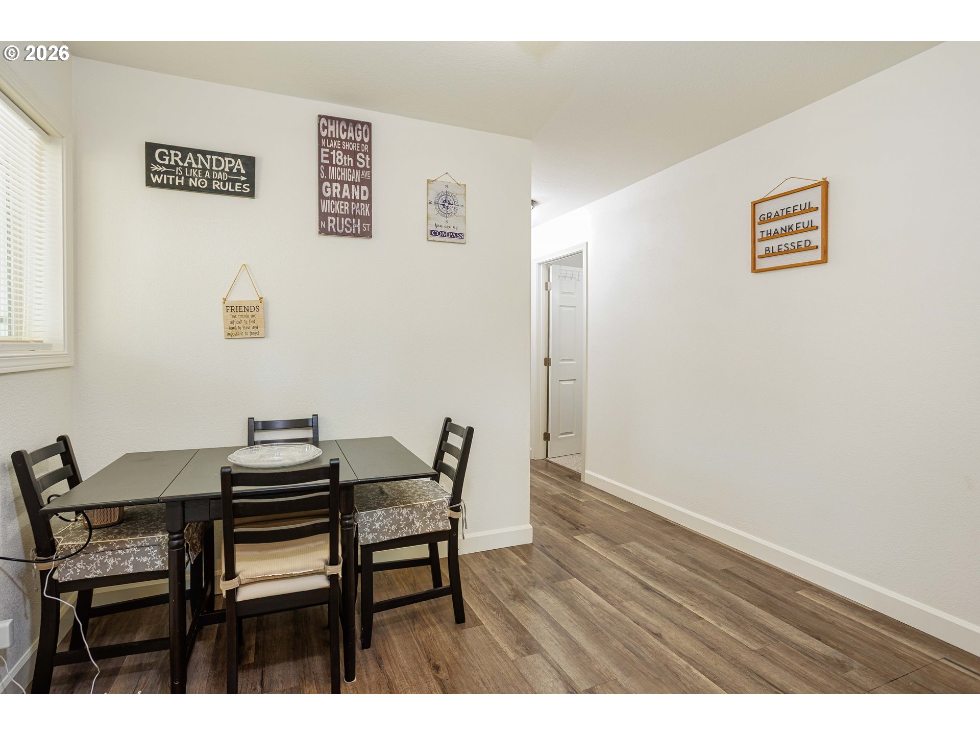 8715 Northeast Clackamas Street Portland, OR 97220 - Photo 14 of 25 a view of a table and chairs in a room