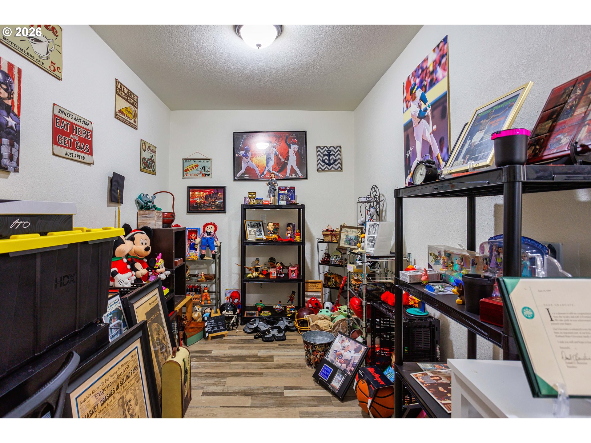8715 Northeast Clackamas Street Portland, OR 97220 - Photo 20 of 25 a view of a garage with a lot of stuff