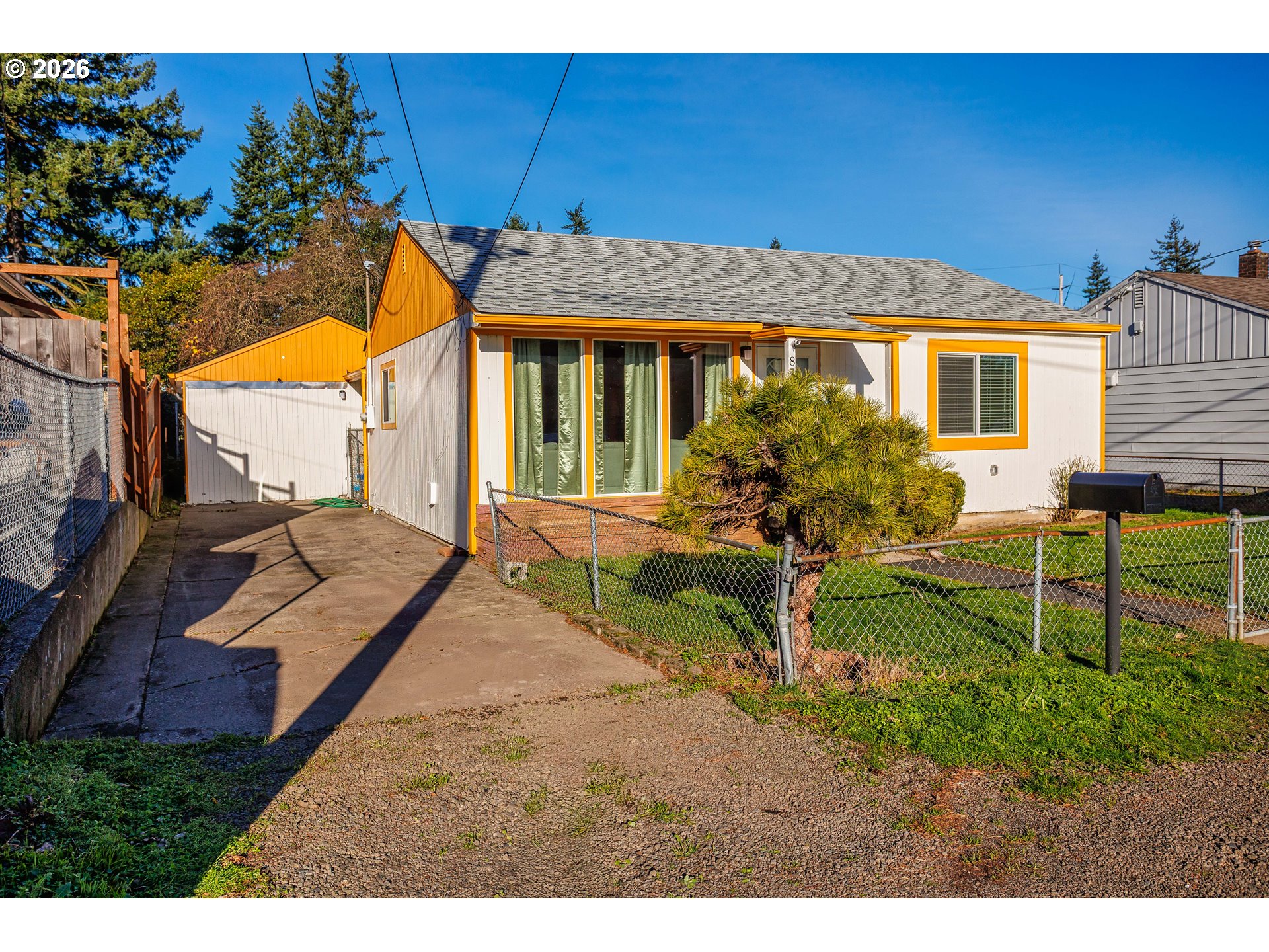8715 Northeast Clackamas Street Portland, OR 97220 - Photo 2 of 25 a view of a house with backyard and sitting area