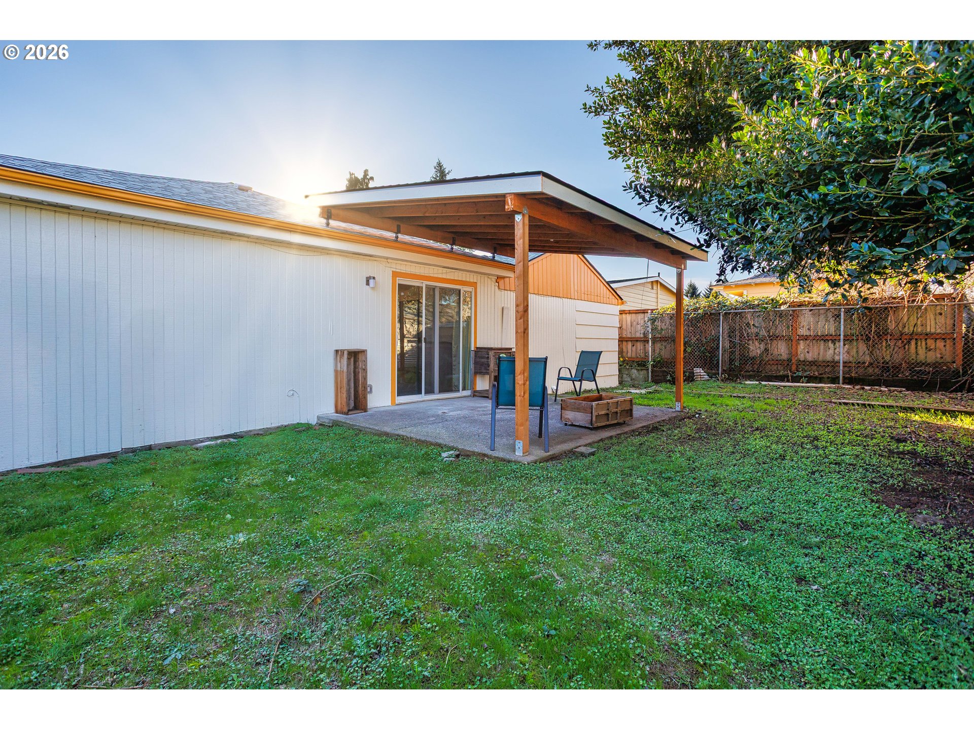 8715 Northeast Clackamas Street Portland, OR 97220 - Photo 24 of 25 a backyard of a house with table and chairs