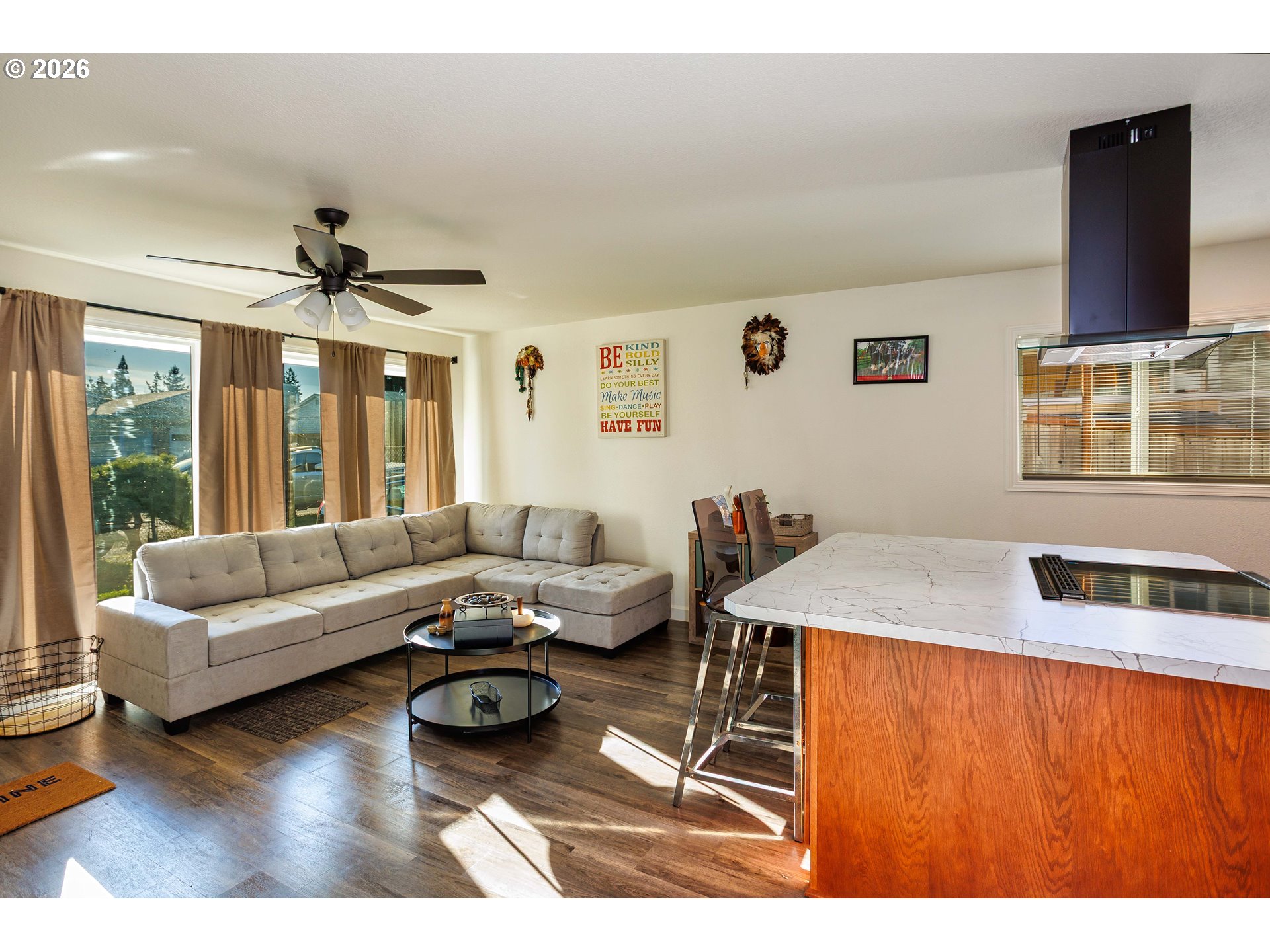 8715 Northeast Clackamas Street Portland, OR 97220 - Photo 6 of 25 a living room with furniture a rug and a large window