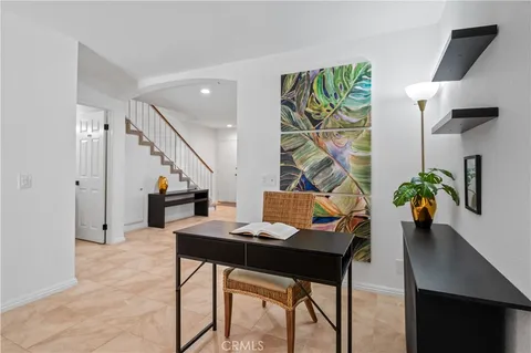 a workspace with furniture and window