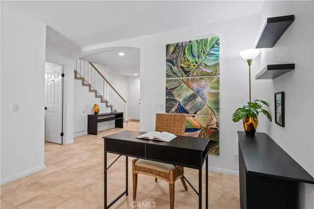 a workspace with furniture and window