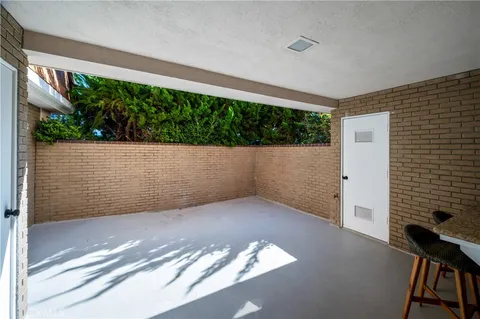 a view of room with a floor to ceiling window and stairs