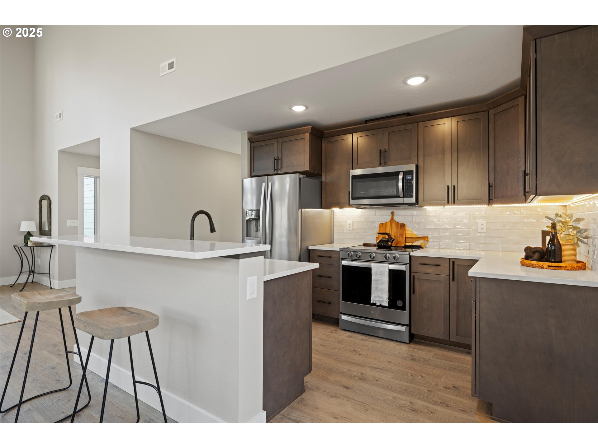 1801 Southwest 1st Street Pendleton, OR 97801 - Photo 7 of 29 a kitchen with stainless steel appliances a refrigerator and a sink