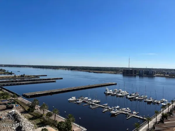 a kitchen with cabinets and window
